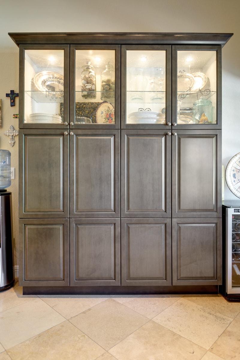 Tall cabinets displaying accessories in glass-paneled cabinets.